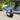 80 gph premium fountain pump with an unfocused fountain and flowers